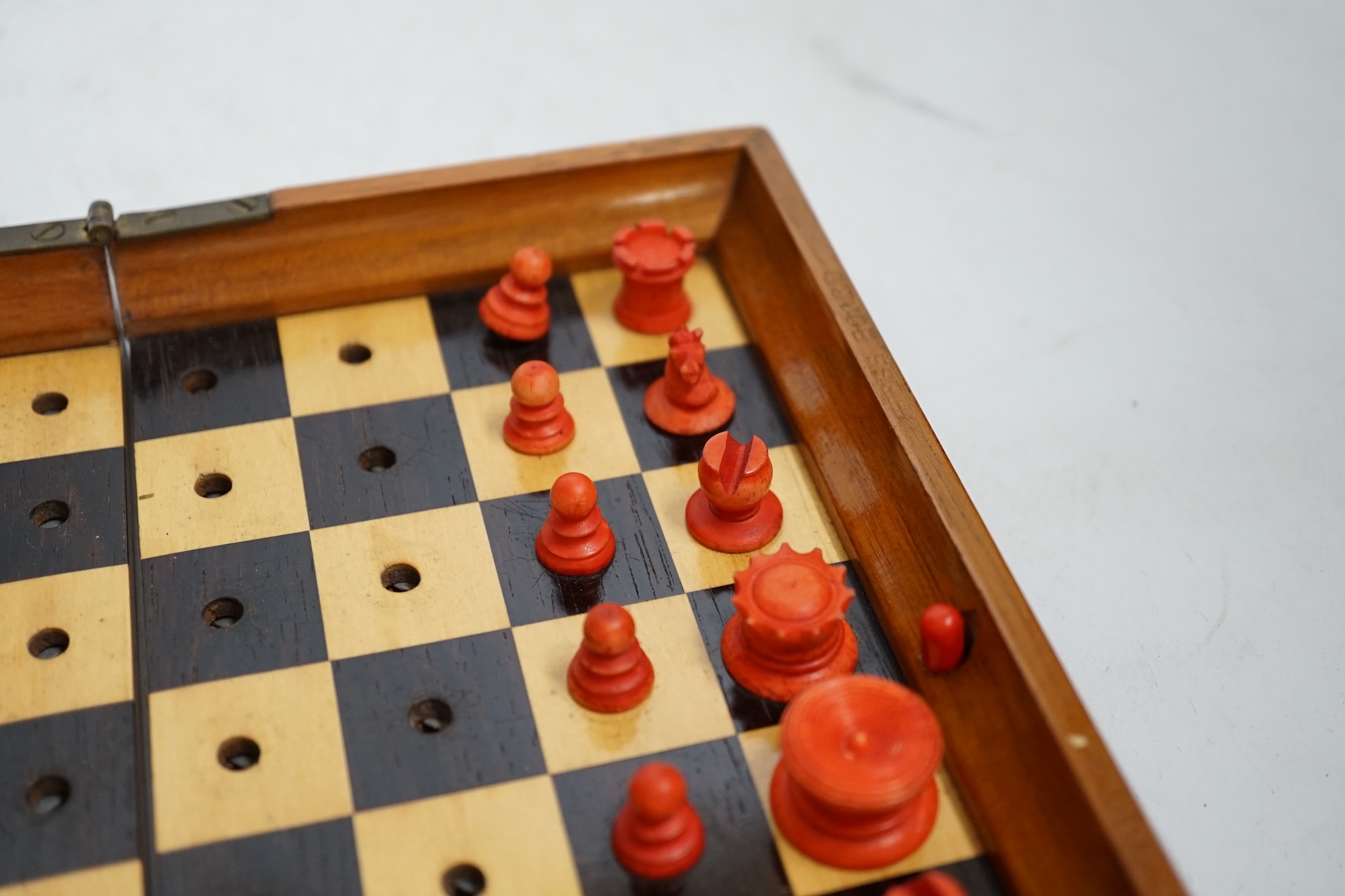 A Jaques in Statu Quo travelling chess set with bone pieces, leather slip case. Condition - fair